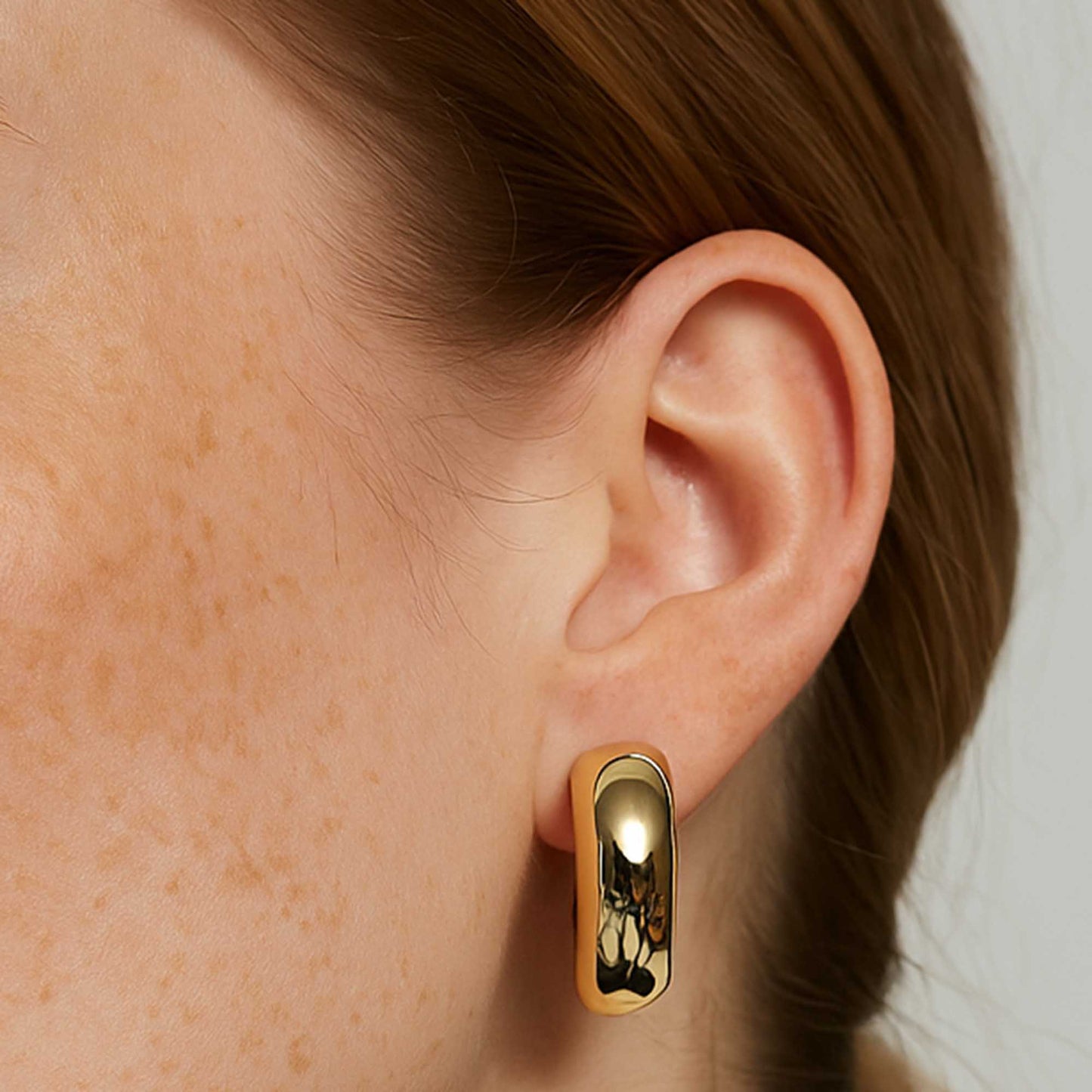 Women's Hollow Tube Metallic Crescent Hoop Earrings – Gold Tone Statement Earrings by Cherie Code
